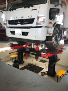 White Car Under Maintenance - Truck Mechanic Darwin in Winnellie, NT